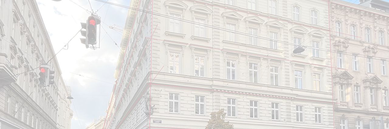 Straße mit Gemeindebauten in Wien.
